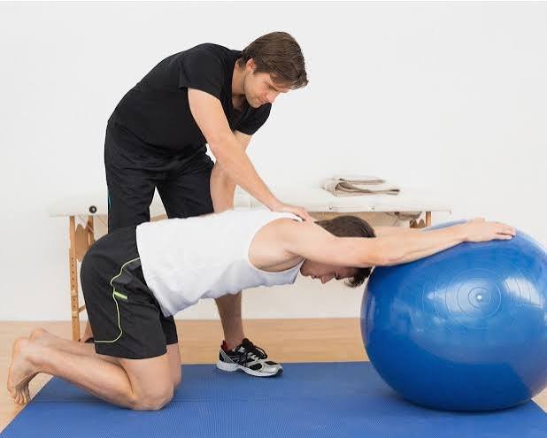 Vishal Panchal coaching a corrective exercise progression